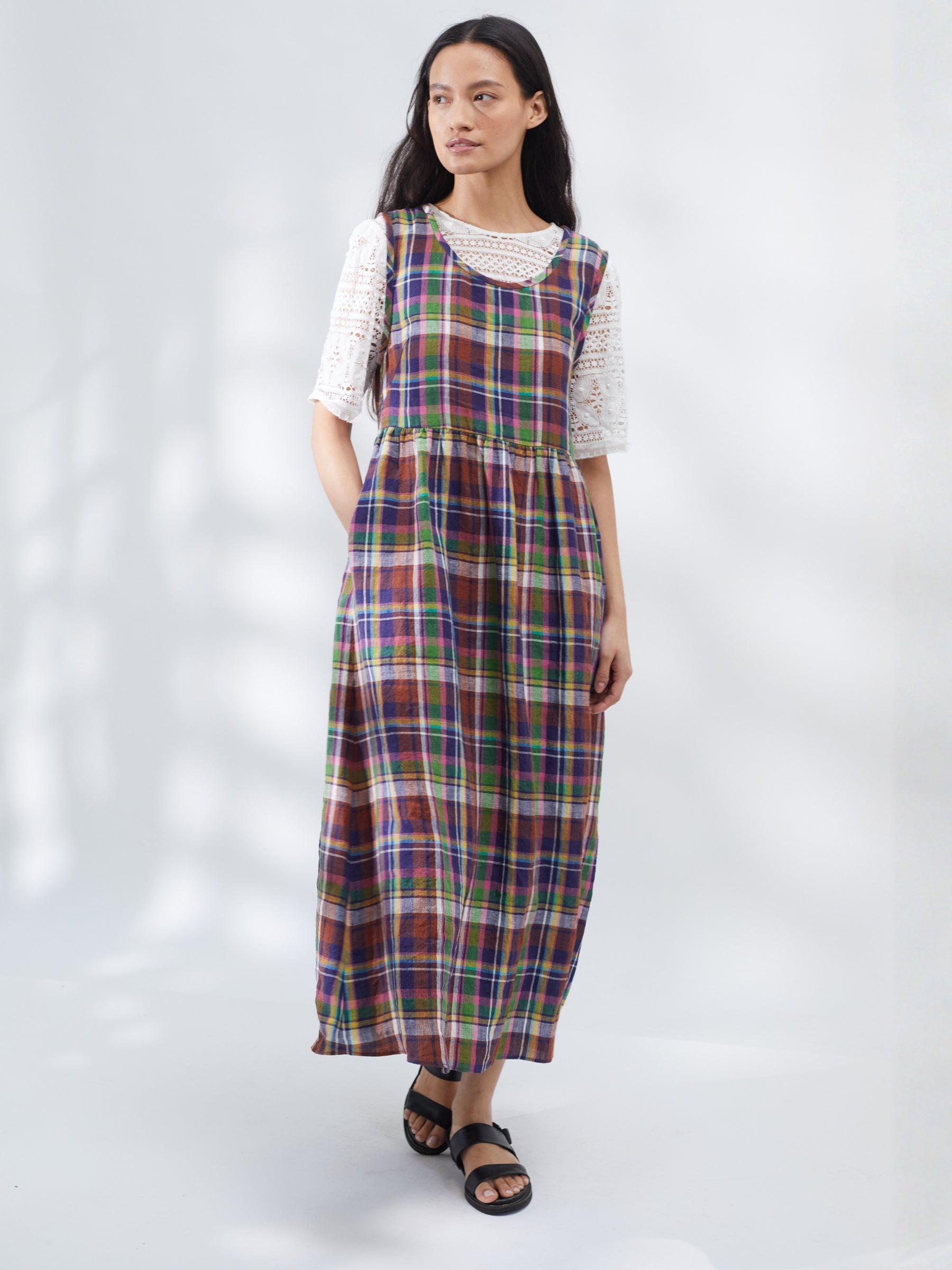 Woman wearing a plaid dress on a white background | Made in England | Justine Tabak