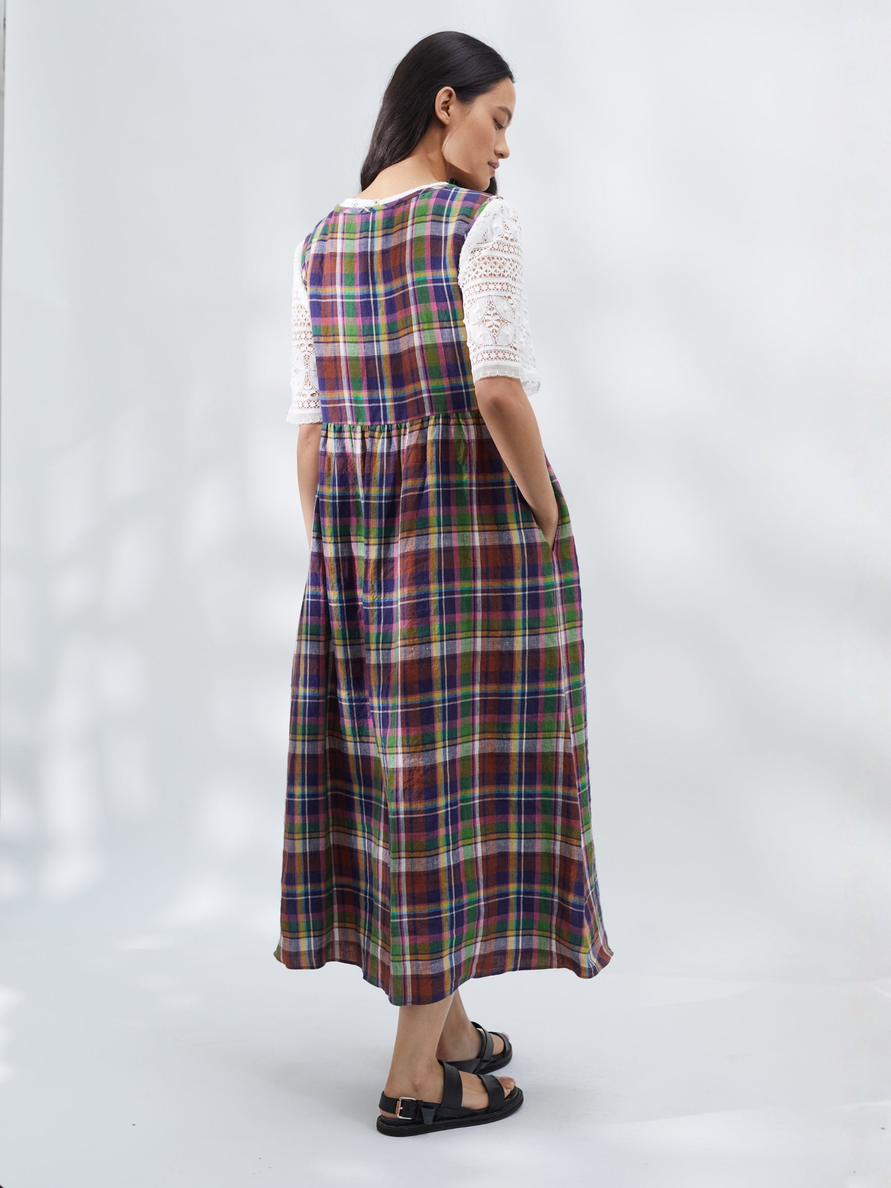 Woman wearing a plaid dress on a white background | Made in England | Justine Tabak 