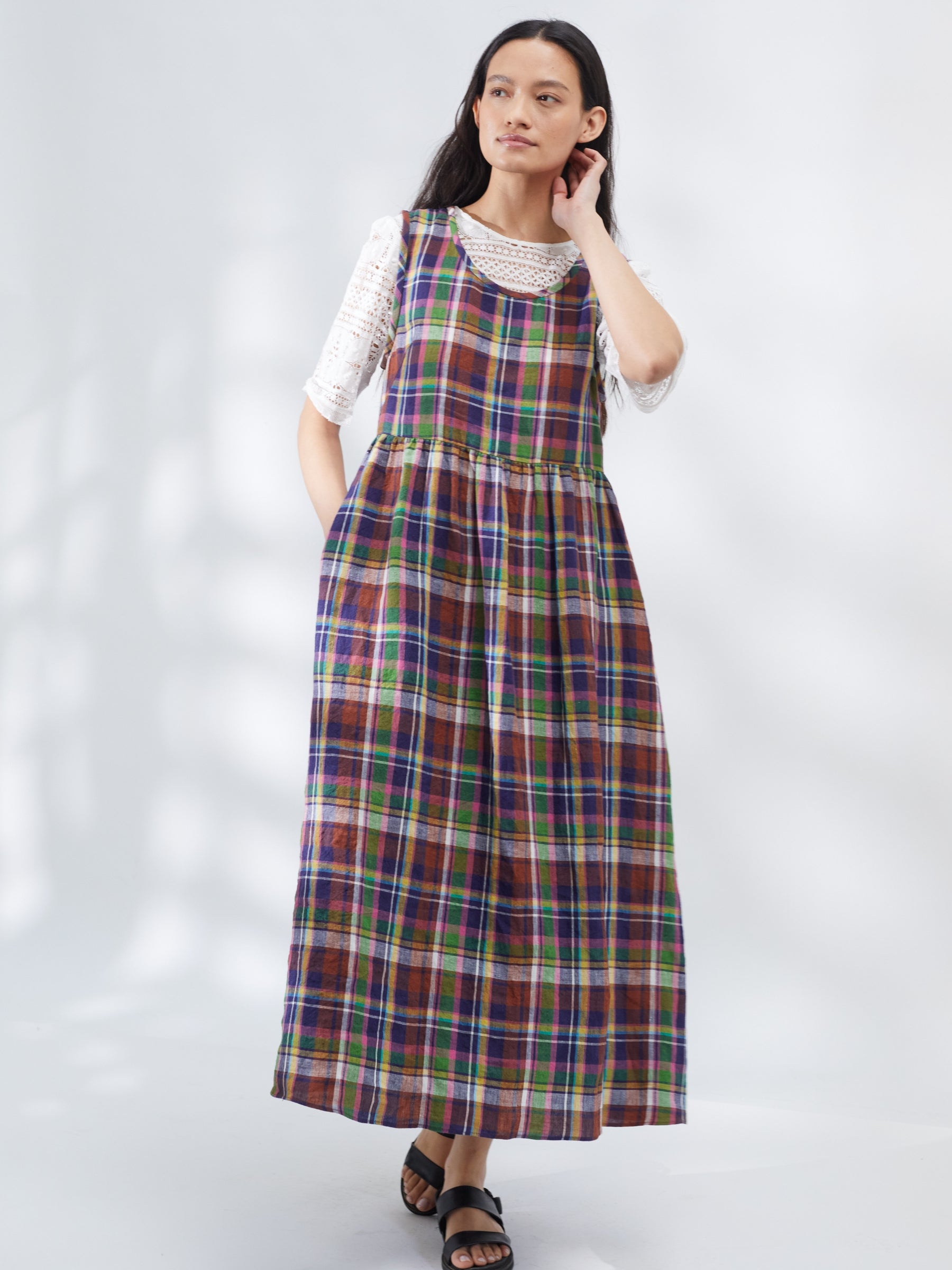 Woman wearing a plaid dress on a white background | Made in England | Justine Tabak 